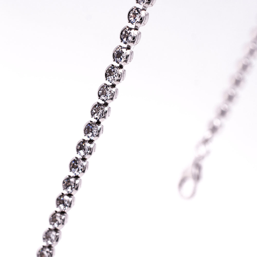 
                  
                    An elegant Super Silver silver chain with dainty diamonds for an adjustable length.
                  
                
