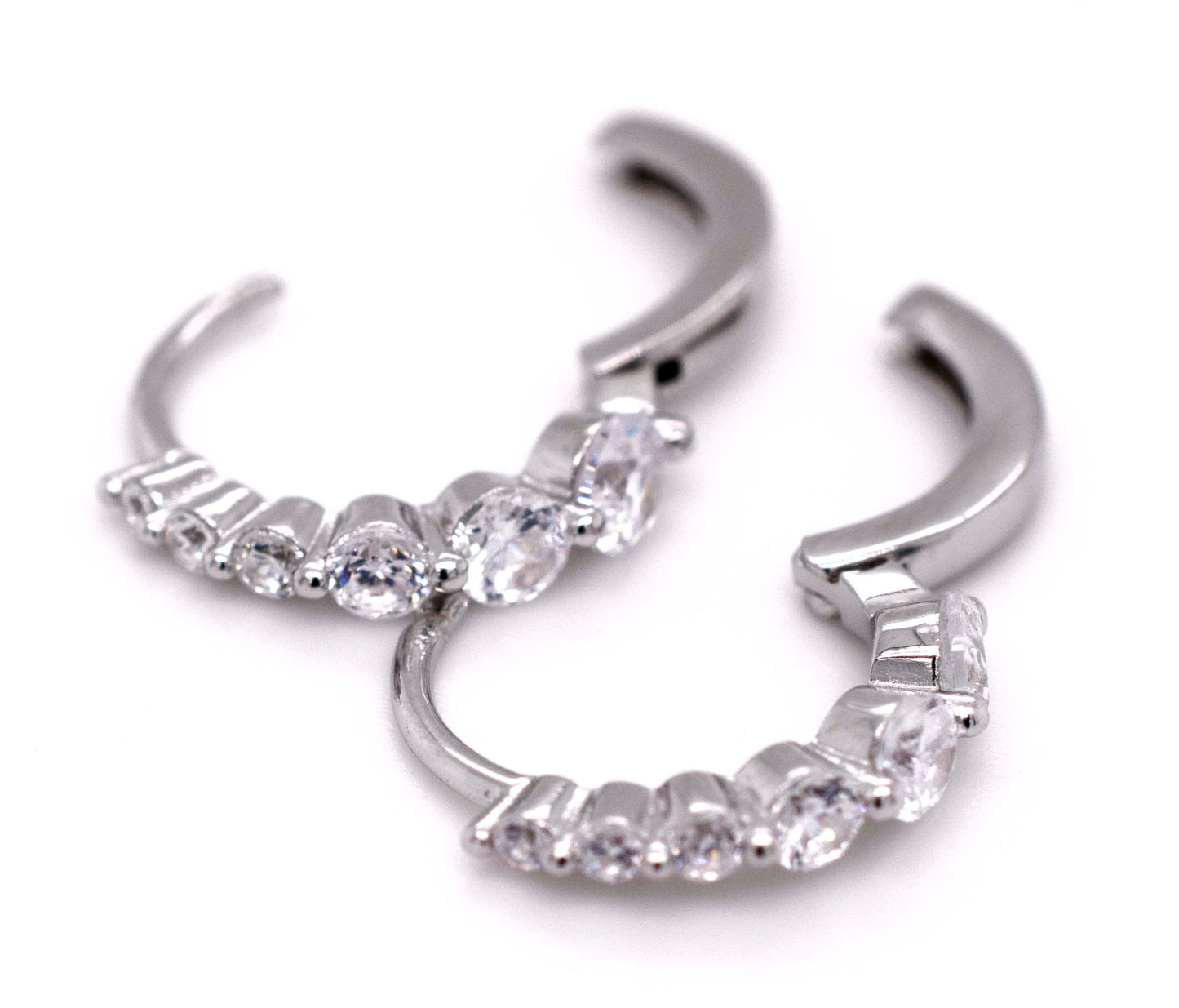 A pair of Super Silver Small Cubic Zirconia Hoops, made of white gold.