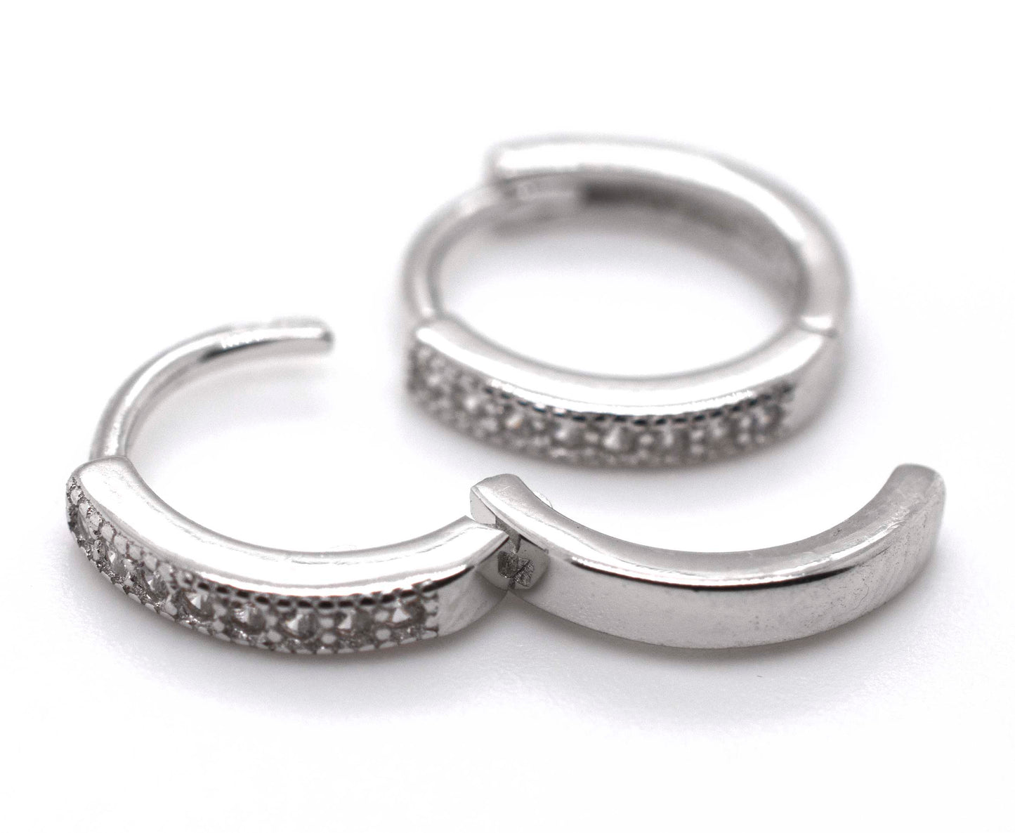 A pair of Small Pave Cubic Zirconia Hoops by Super Silver, a diamond alternative.