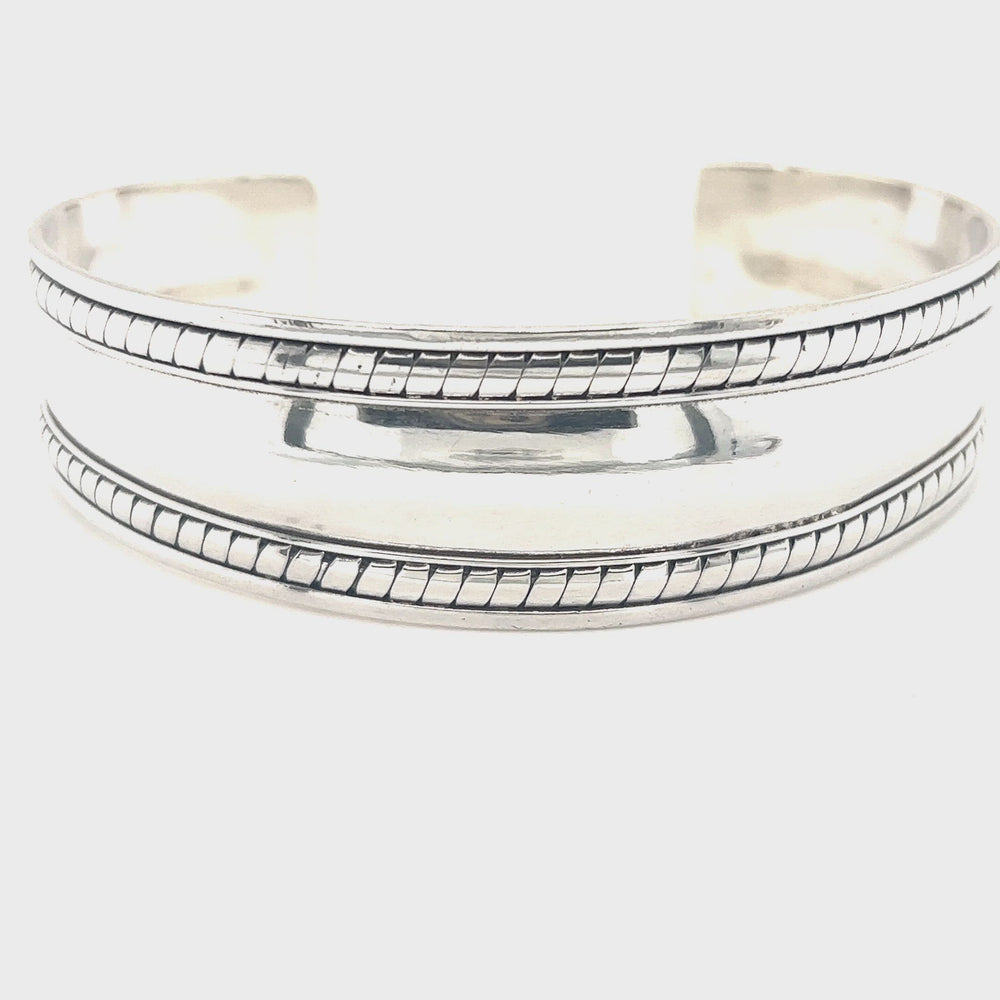 
                  
                    Load and play video in Gallery viewer, Domed Silver Cuff Bracelet with Rope Etching
                  
                