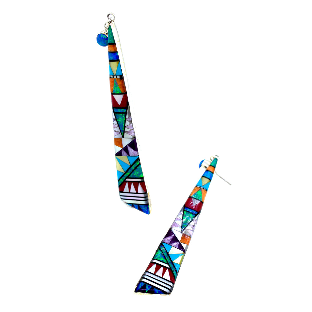 
                  
                    Super Silver's Handcrafted Elongated Triangle Earrings, with colorful geometric designs, are perfect for those seeking a tribal feel. These earrings are meticulously handmade using high-quality materials.
                  
                