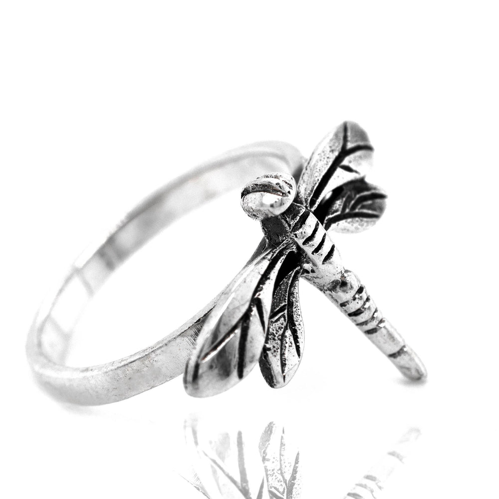 
                  
                    A Brilliant Silver Dragonfly Ring on a white background.
                  
                