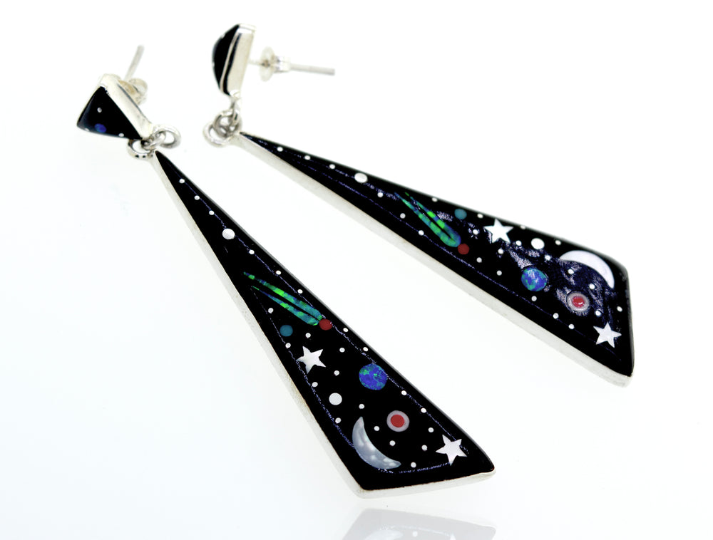 Super Silver's Handcrafted Outer Space Earrings adorned with stars and planets from the universe.