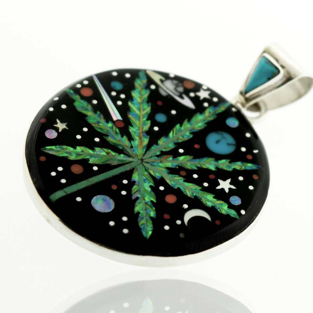 A Handcrafted Mary Jane Outer space Pendant featuring a marijuana leaf in a space-inspired design, from the brand Super Silver.