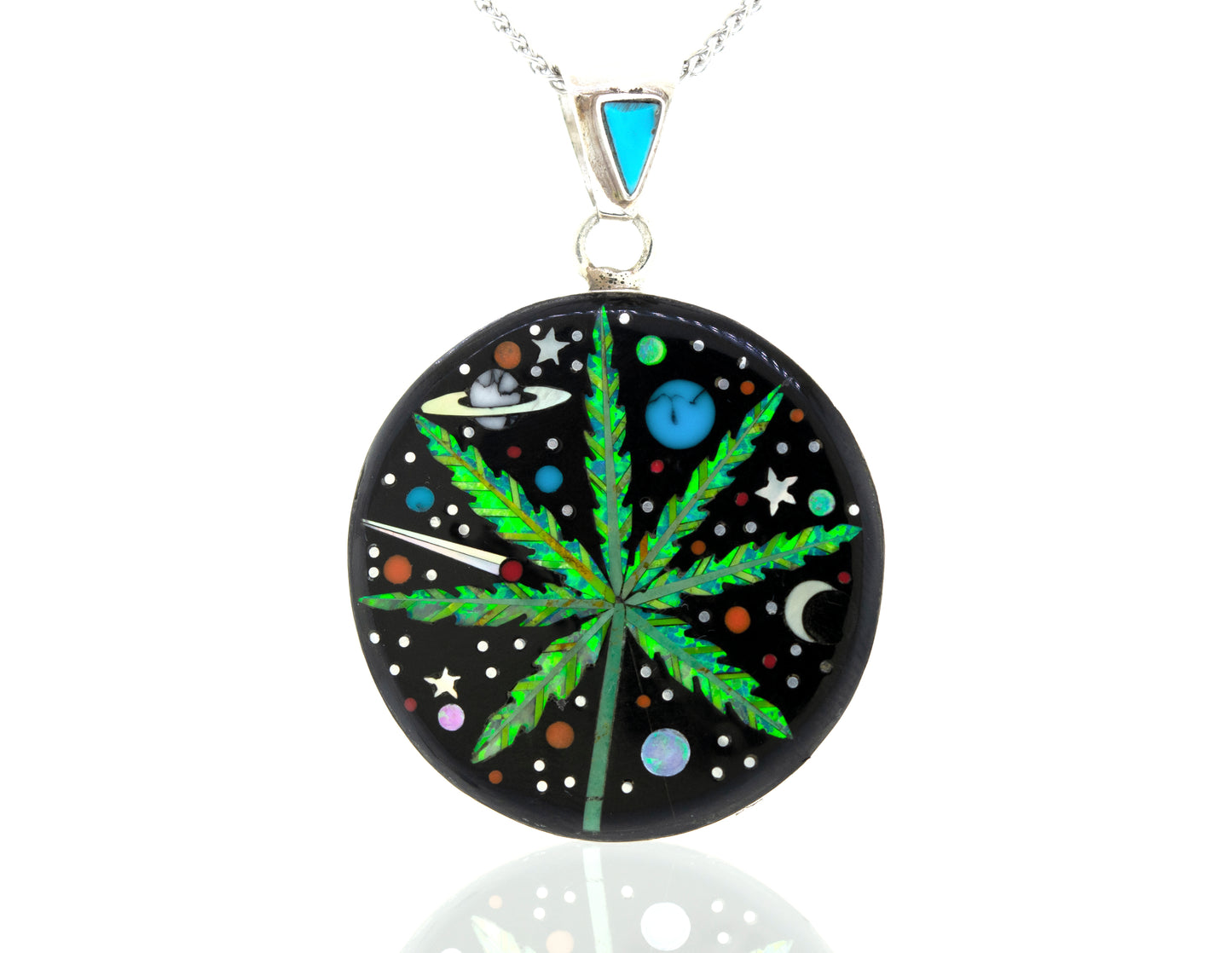 A Super Silver Handcrafted Mary Jane Outer space Pendant with a marijuana leaf design.