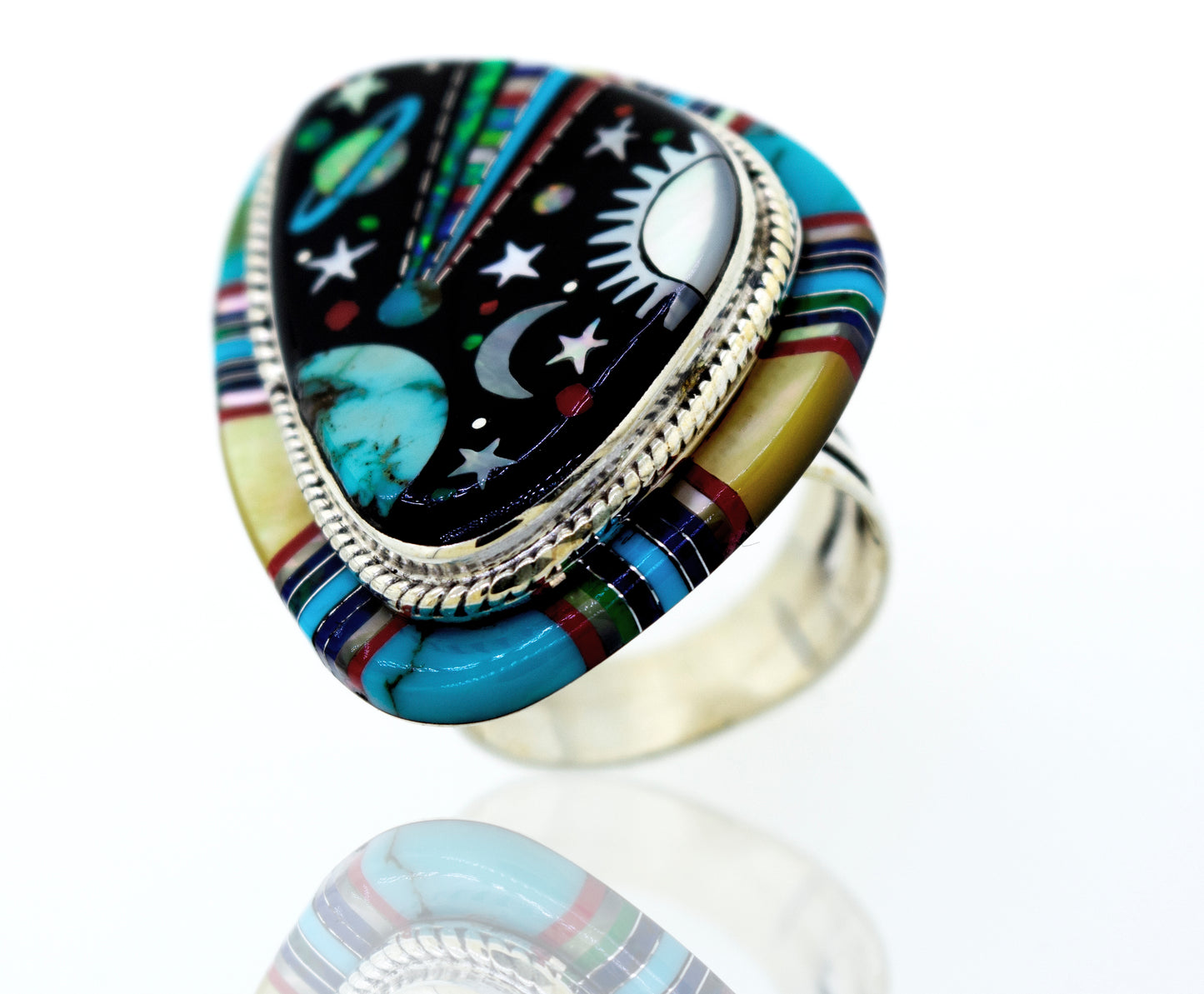 
                  
                    An Exquisite Handcrafted Outer Space Ring with a colorful design inspired by outer space, made by Super Silver.
                  
                