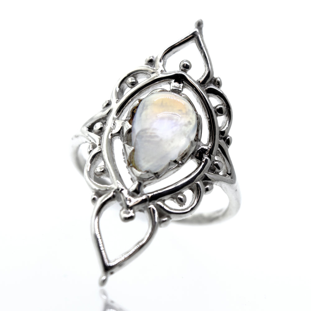 A Super Silver designer sterling silver ring with a moonstone in the center.