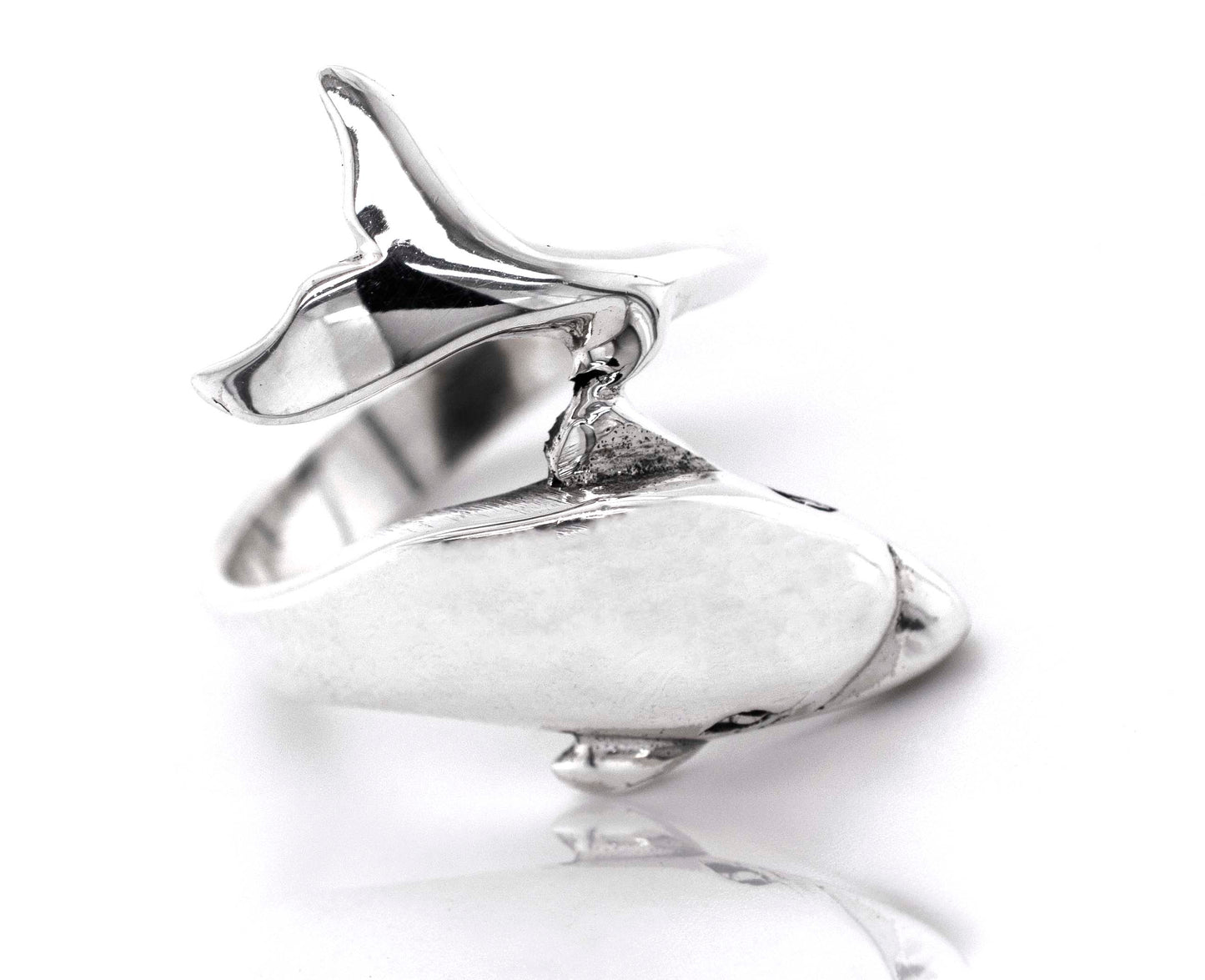 
                  
                    This silver Dolphin ring features a beautiful whale engraving, reminiscent of the soothing ocean waves in Santa Cruz.
                  
                