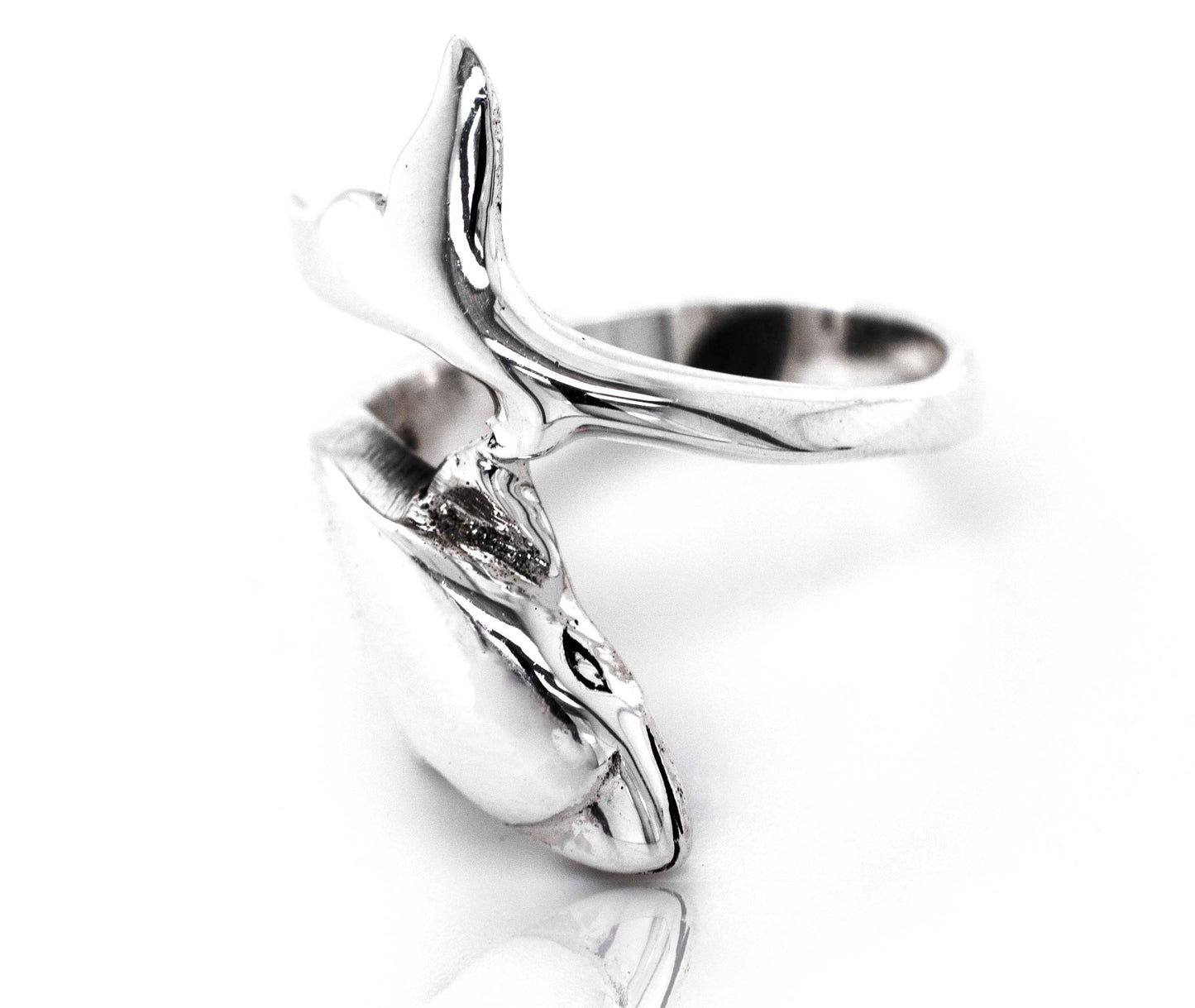 A Dolphin Ring with a dolphin on it.