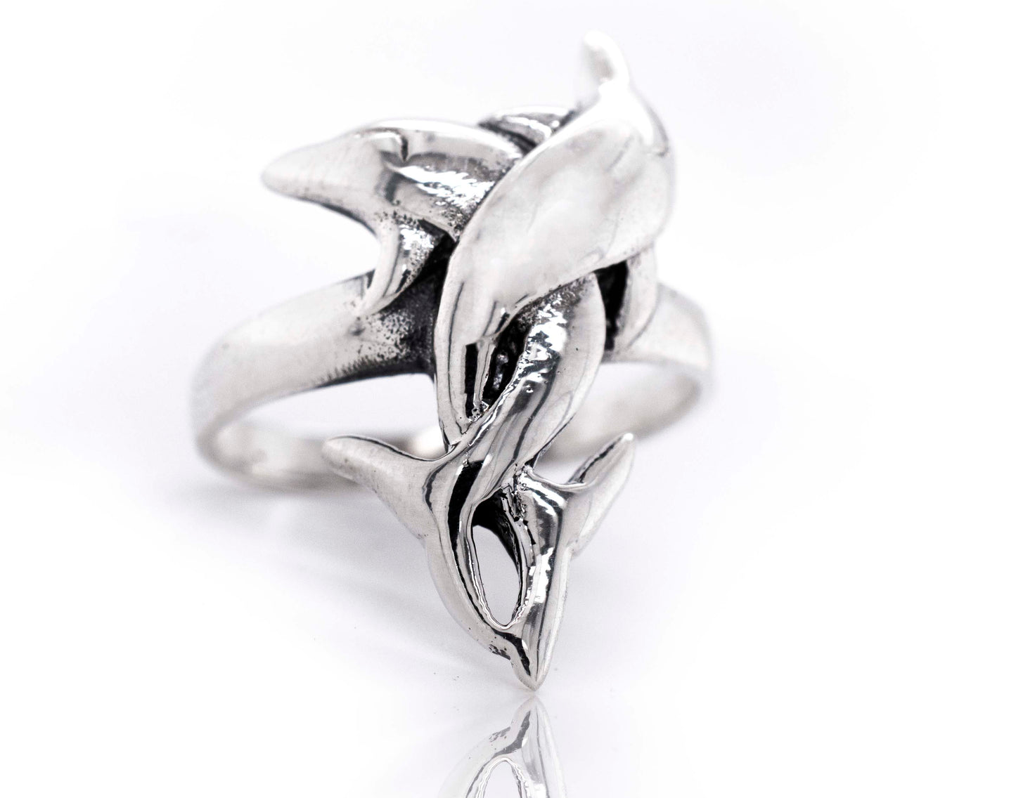 A Coiled Dolphin Ring.
