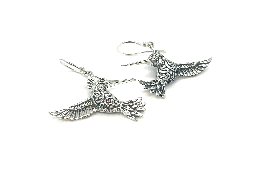 
                  
                    A pair of Super Silver Stunning Handcrafted Hummingbird Earrings from the artisan collection, showcasing the beauty of nature against a white background.
                  
                