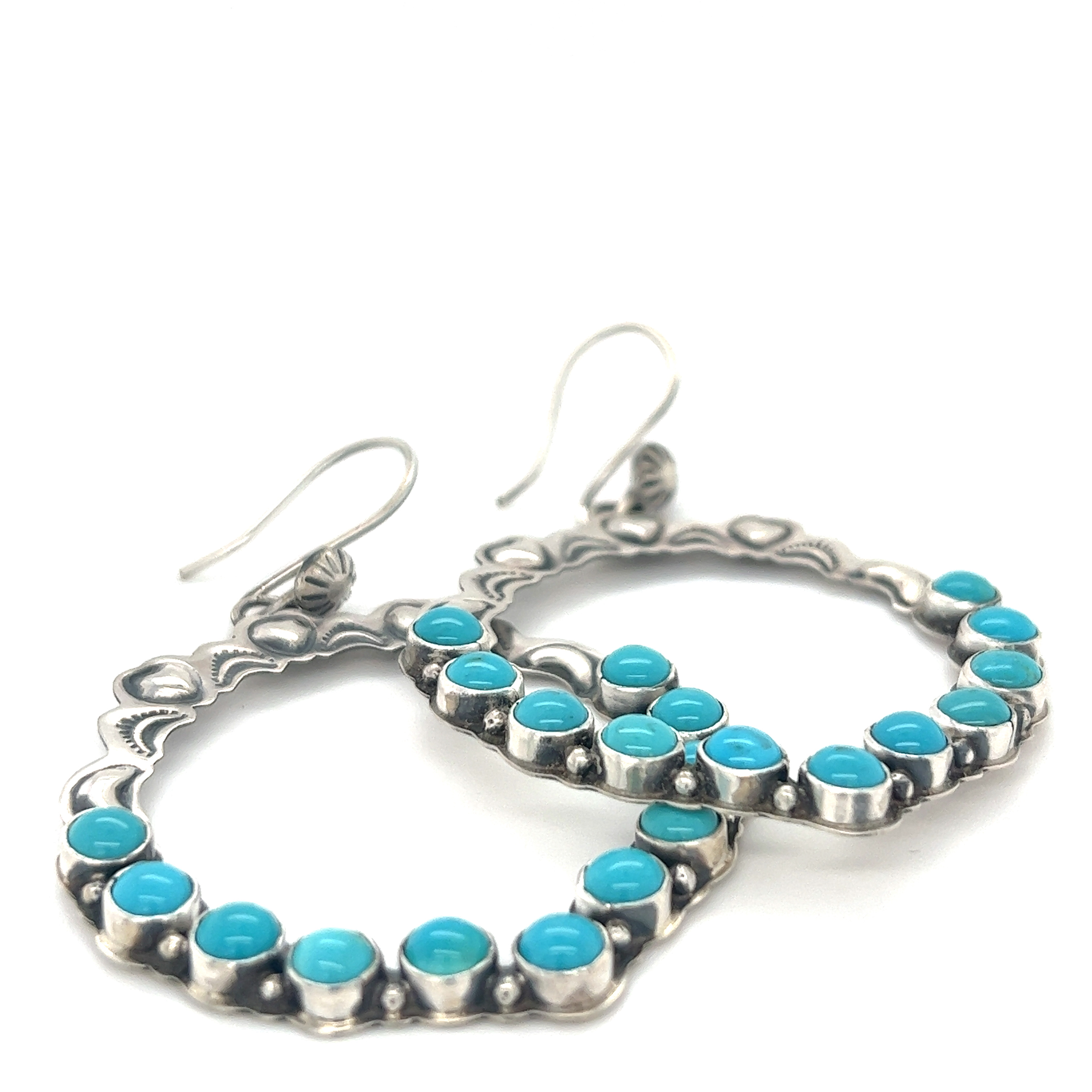Super Silver's Statement Handmade Turquoise Earrings, on a white background, exuding southwestern elegance.