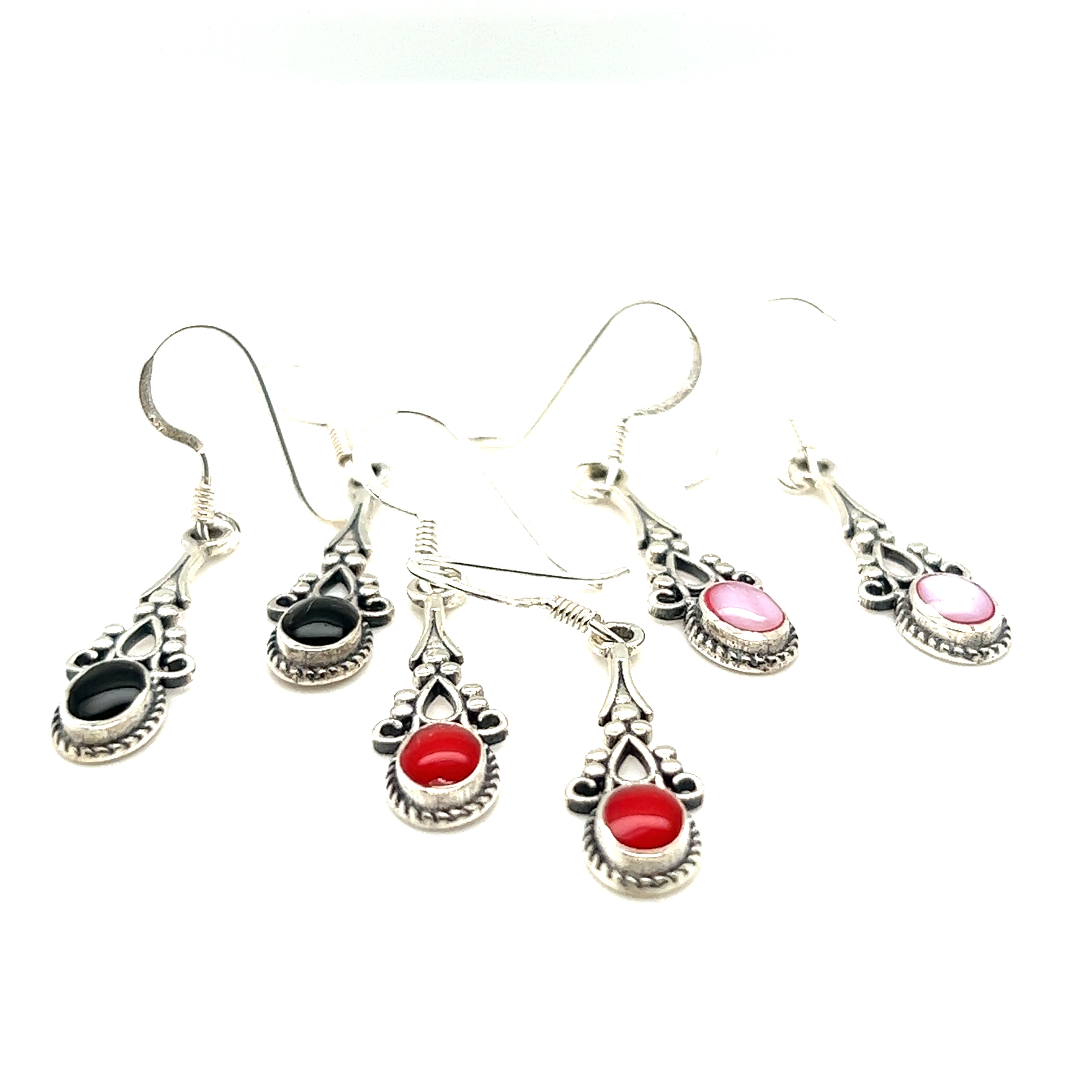 These Super Silver Oval Shaped Inlaid Stone Earrings with Delicate Vintage Setting have a boho look, featuring red and black stones for an earthy refinement.