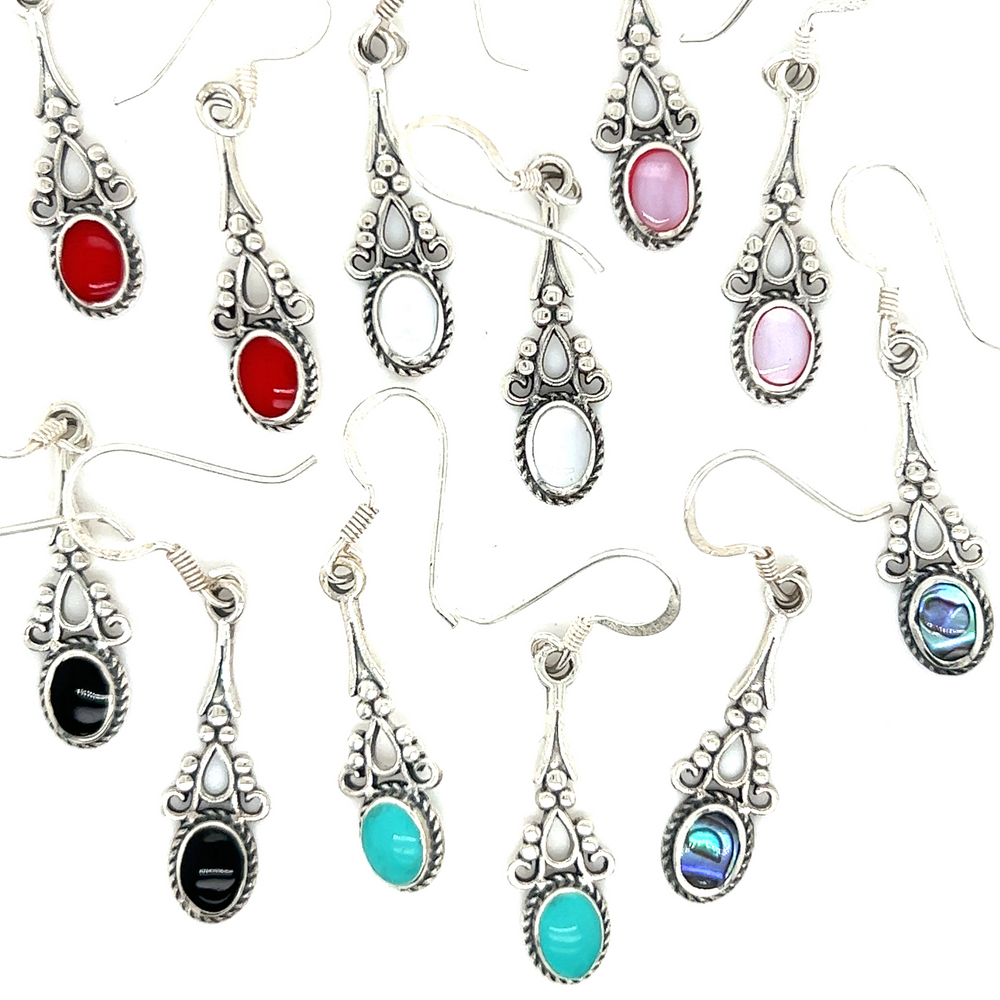 Super Silver's Oval Shaped Inlaid Stone Earrings with Delicate Vintage Setting, featuring colored stones, bring an earthy refinement to any look.
