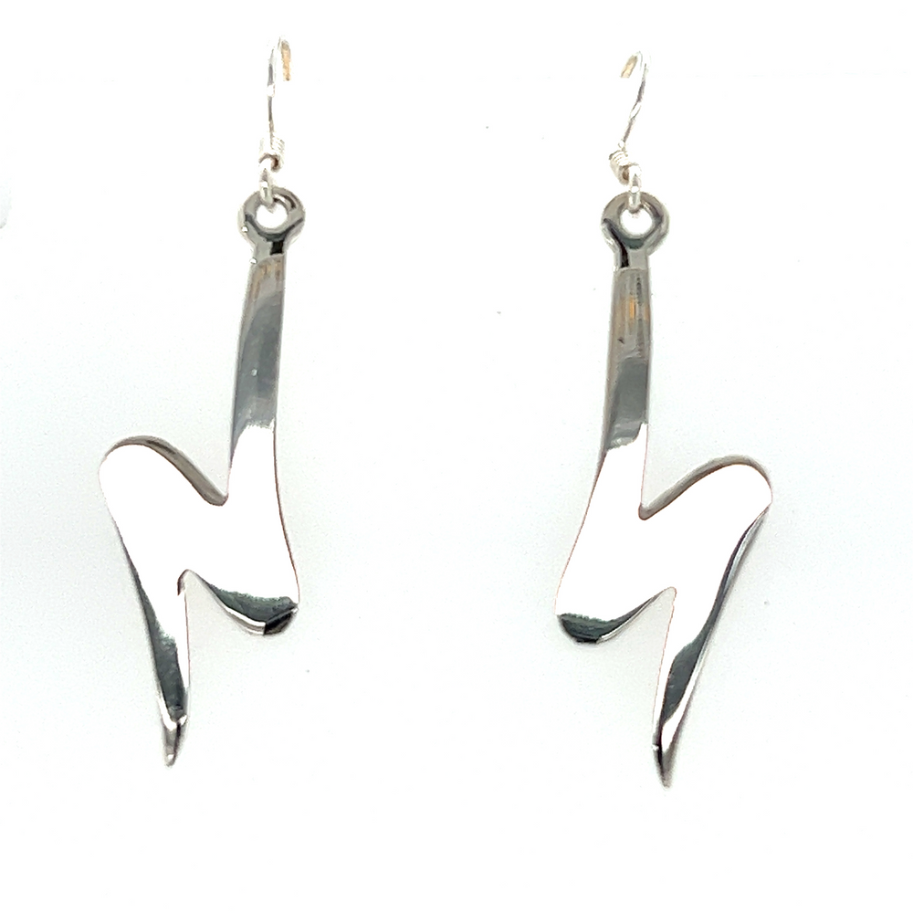 A pair of chic Super Silver silver lightning bolt earrings on a white background.