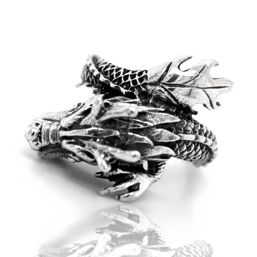 
                  
                    A mythical Striking Silver Dragon Ring, suitable for men, with a dragon head design.
                  
                