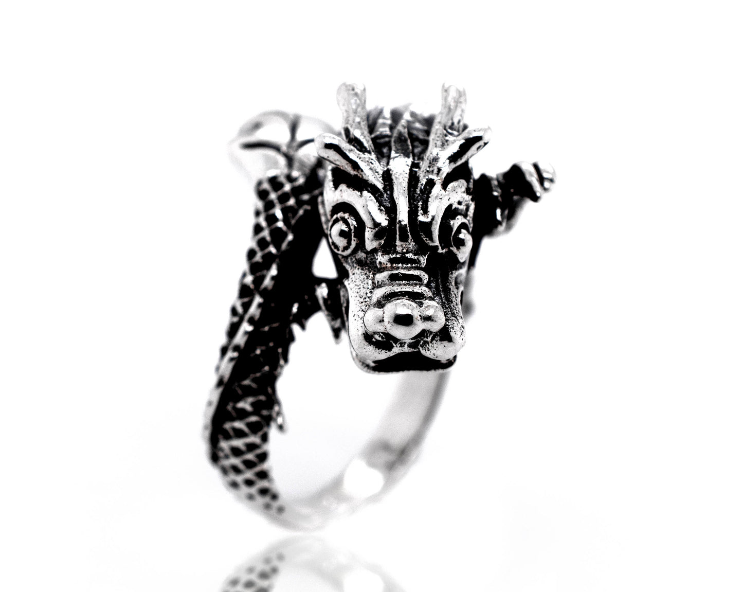 
                  
                    A Striking Silver Dragon Ring with a mythical dragon head.
                  
                
