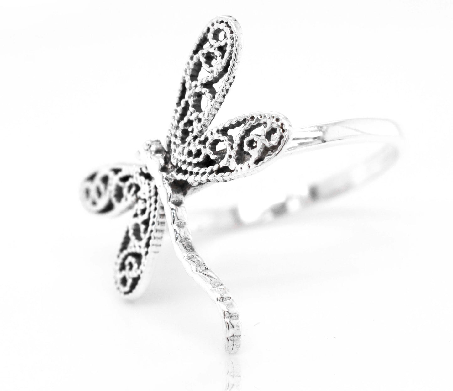 
                  
                    A Dragonfly Ring With Filigree Wings on a white background.
                  
                