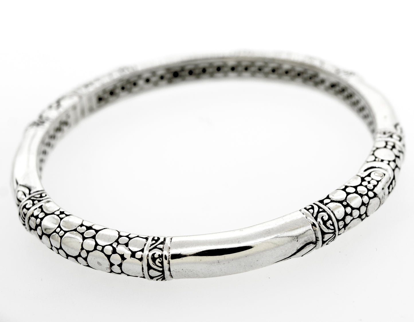 
                  
                    A Super Silver Sterling Silver Handmade Designer Bangle with a bubble design pattern on it.
                  
                