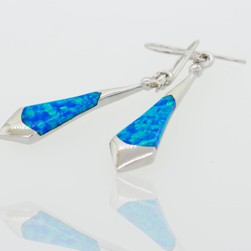 
                  
                    A pair of Super Silver sterling silver Blue Opal Earrings.
                  
                