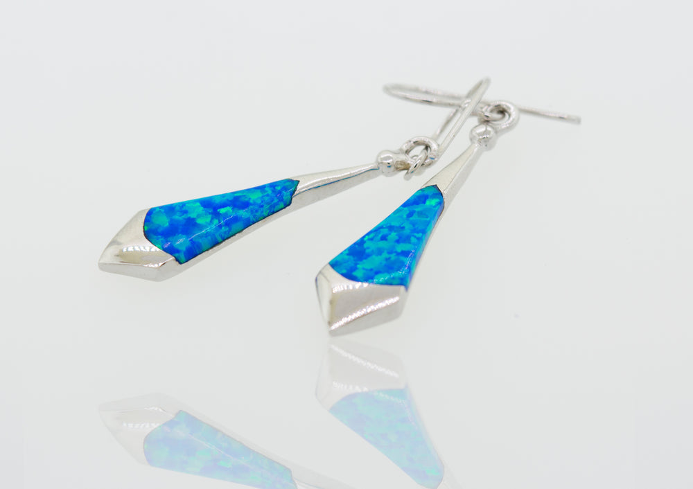 A pair of Super Silver sterling silver Blue Opal Earrings.