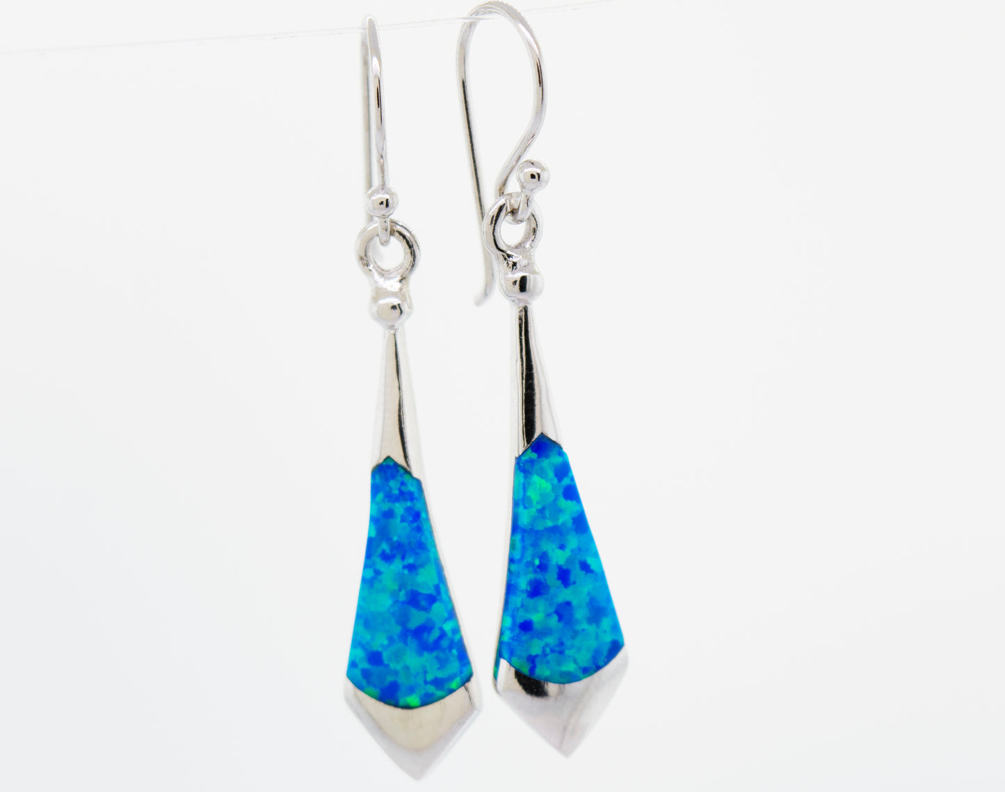 
                  
                    These Super Silver Blue Opal Earrings feature blue opal for a stunning look.
                  
                