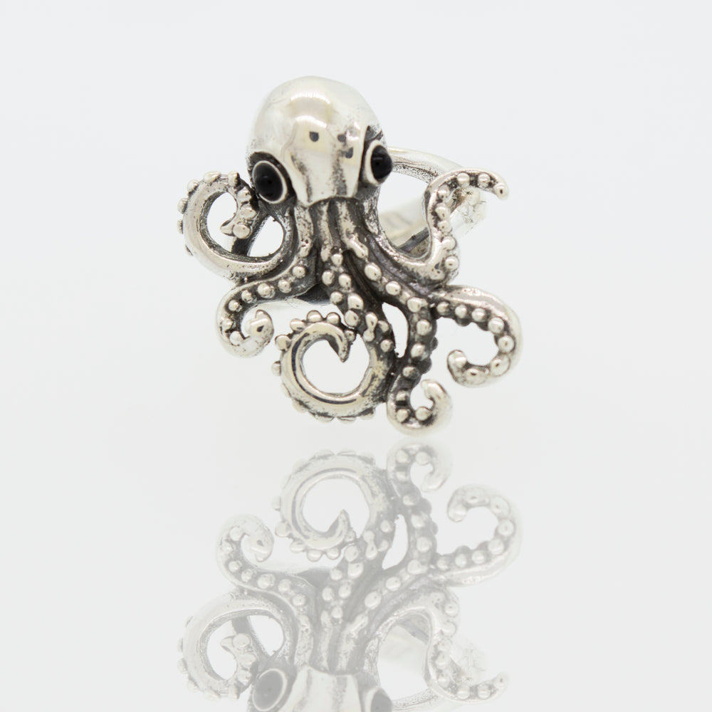 An Octopus Adjustable Ring with tentacle design on a white background.