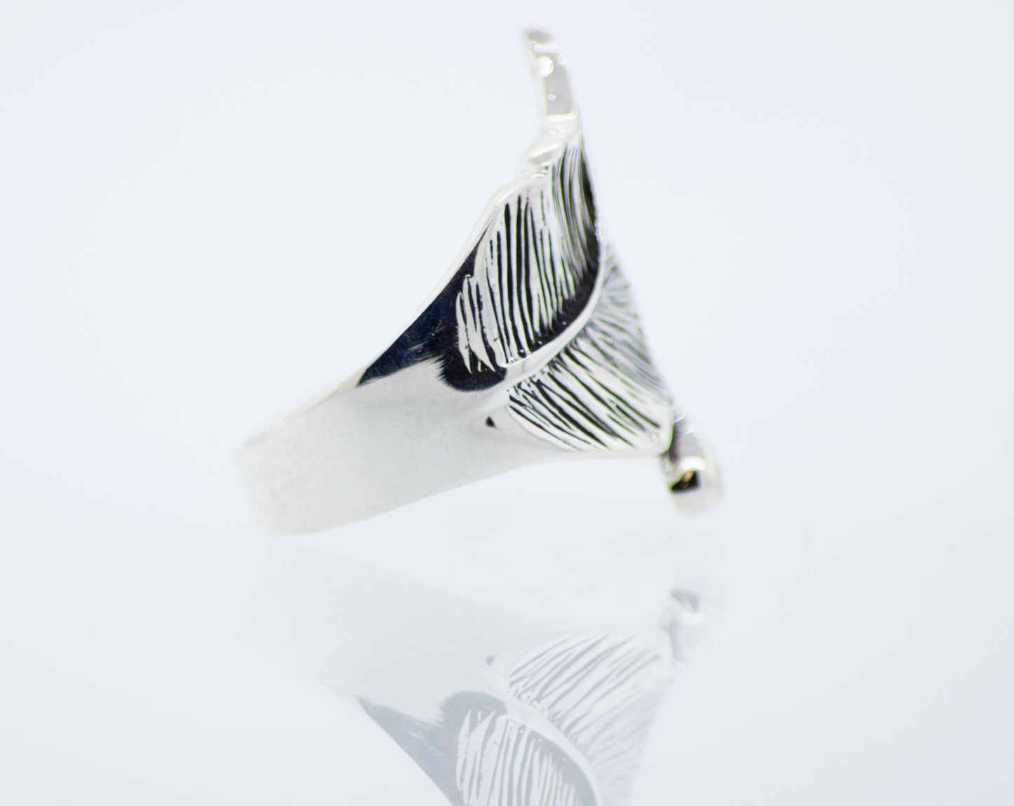 
                  
                    A Super Silver Etched Leaf Ring with a feather design.
                  
                