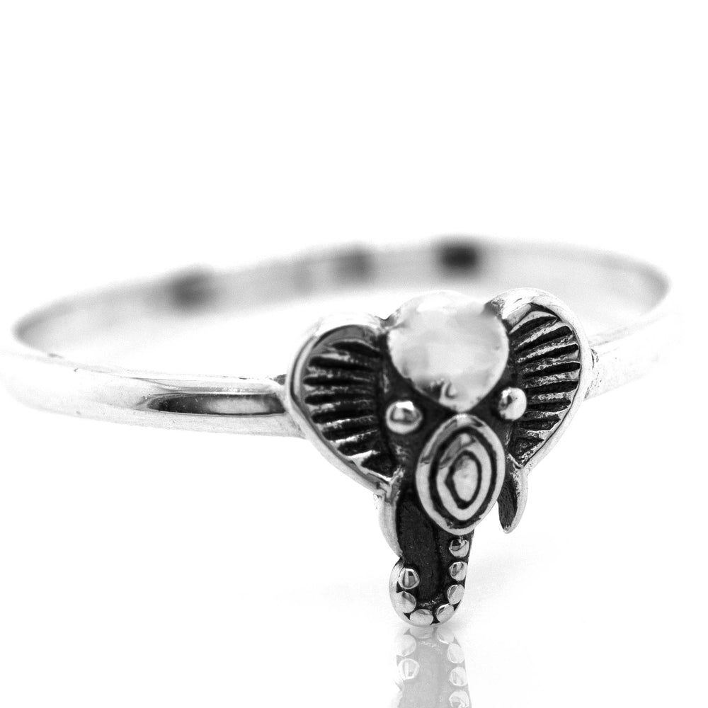 
                  
                    An earthy vibe Super Silver Tribal Elephant Head Wire Ring with a white stone, perfect for those who love the boho-minimalist style.
                  
                
