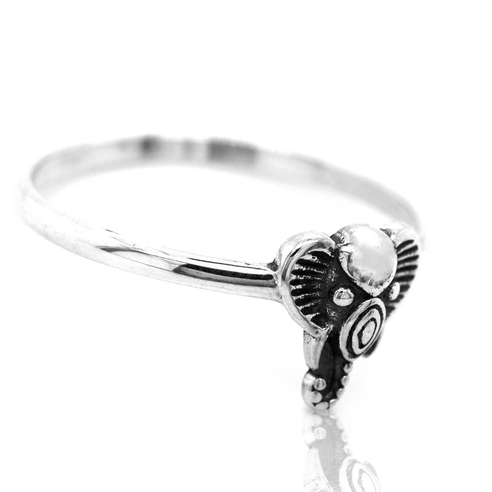 A Super Silver Tribal Elephant Head Wire Ring in a boho-minimalist style.