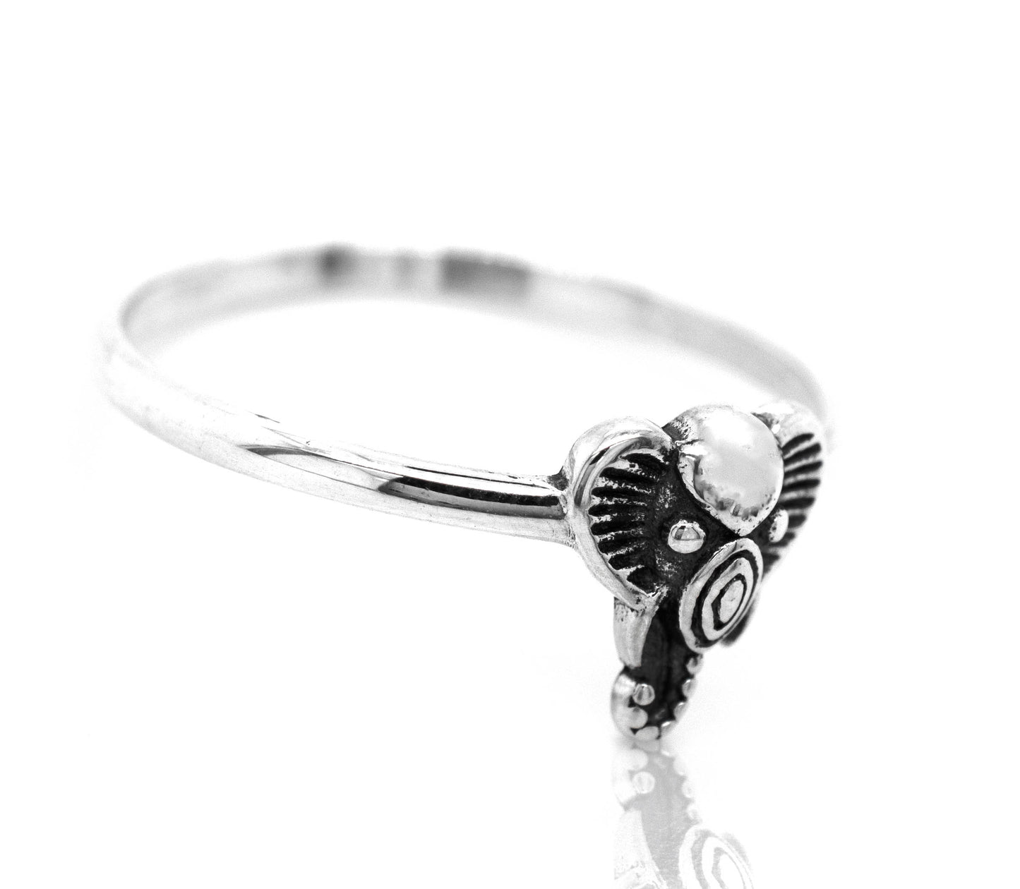 
                  
                    A Super Silver Tribal Elephant Head Wire Ring in a boho-minimalist style.
                  
                
