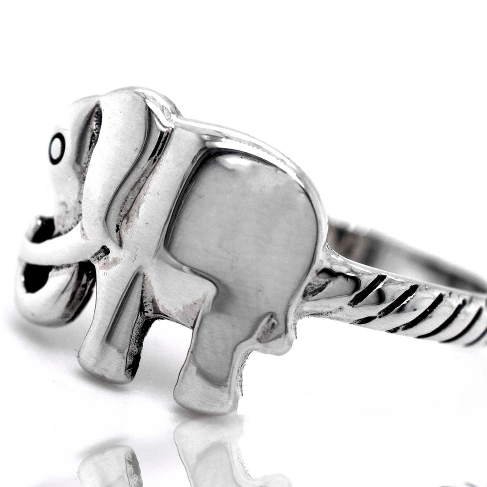 A Super Silver elephant ring on a white background.