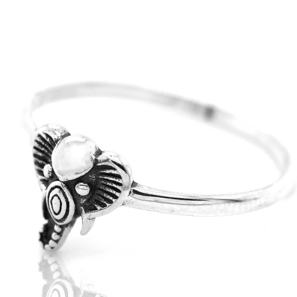 A Tribal Elephant Head Wire Ring from Super Silver, with a white stone, exuding an earthy vibe.