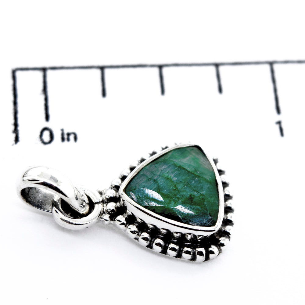 
                  
                    A Super Silver beautiful triangular shape turquoise pendant with beads design.
                  
                
