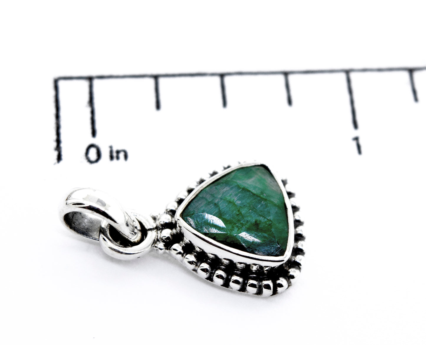 
                  
                    A Beautiful Triangular Shape Emerald Pendant With Beads Design by Super Silver.
                  
                