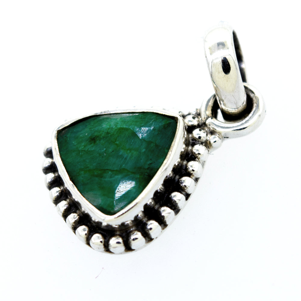 A Beautiful Triangular Shape Emerald Pendant With Beads Design from Super Silver, with an emerald stone in a silver setting.