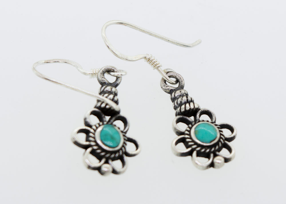 
                  
                    Flower Design Earrings With a Round Stone
                  
                