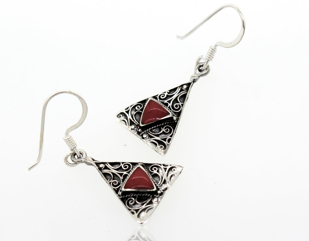 
                  
                    Freestyle Design Triangle Shape Coral Earring
                  
                