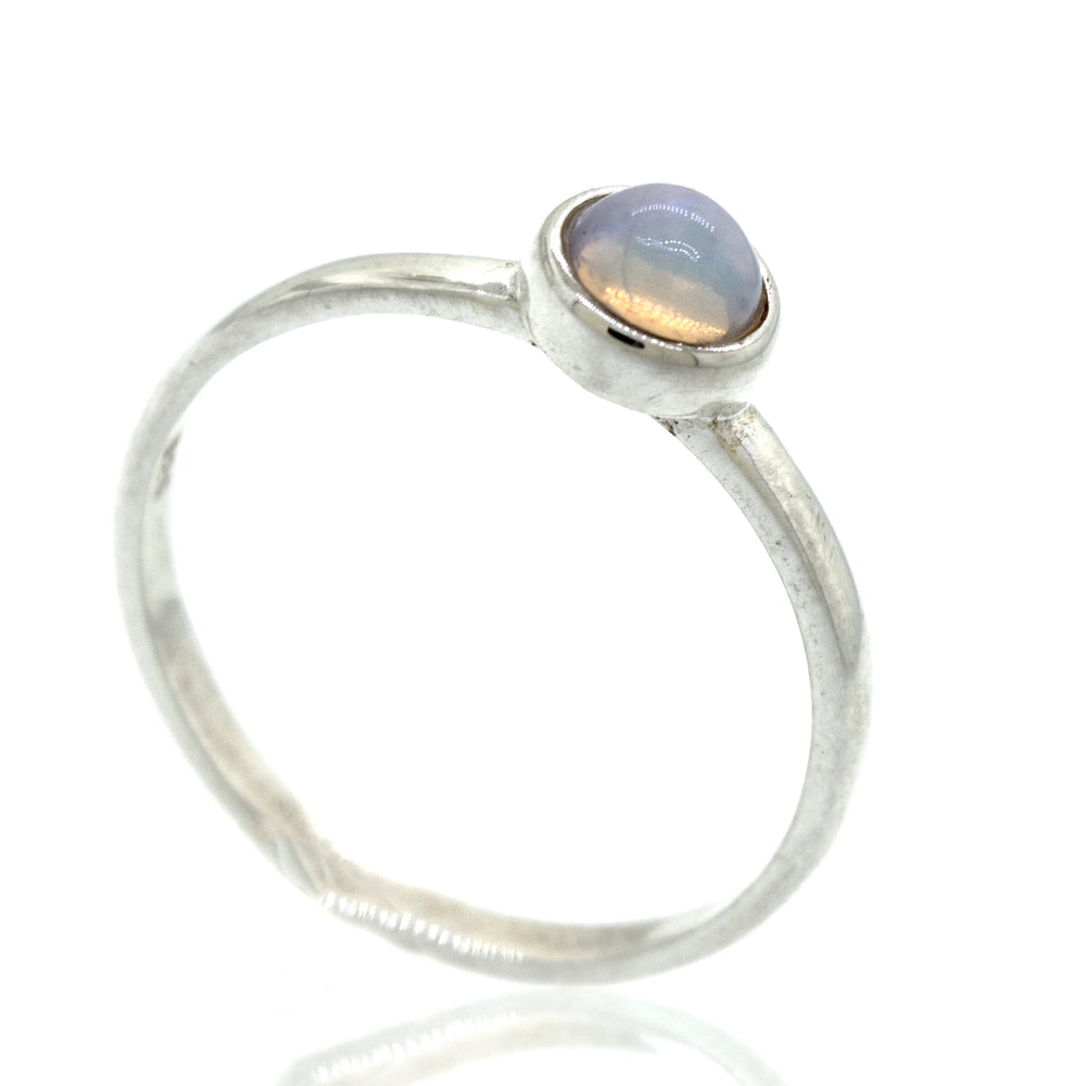 An elegant sterling silver engagement ring with a stunning Glowing Ethiopian Opal Ring, making it a perfect statement piece.