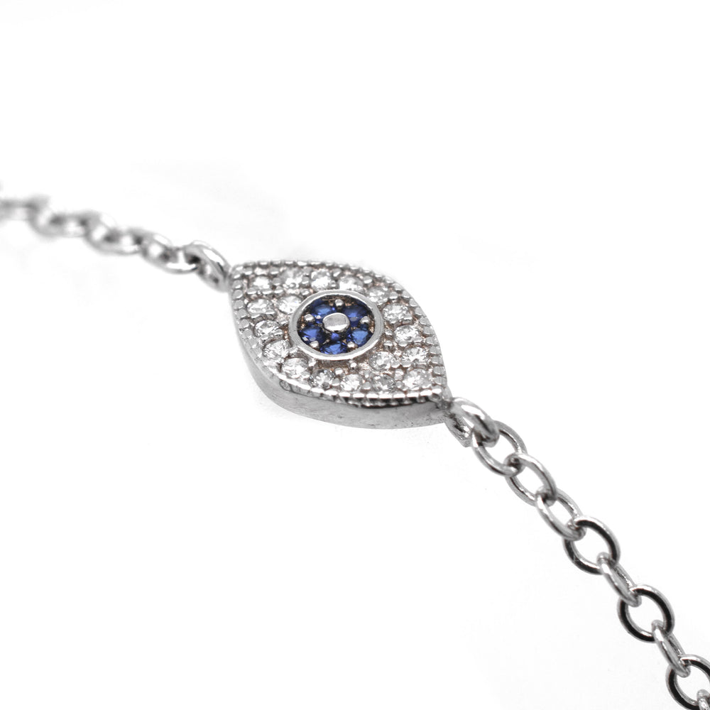 A Super Silver Classic Blue Pave Cubic Zirconia Evil Eye Bracelet, crafted in sterling silver with diamonds and blue sapphires.
