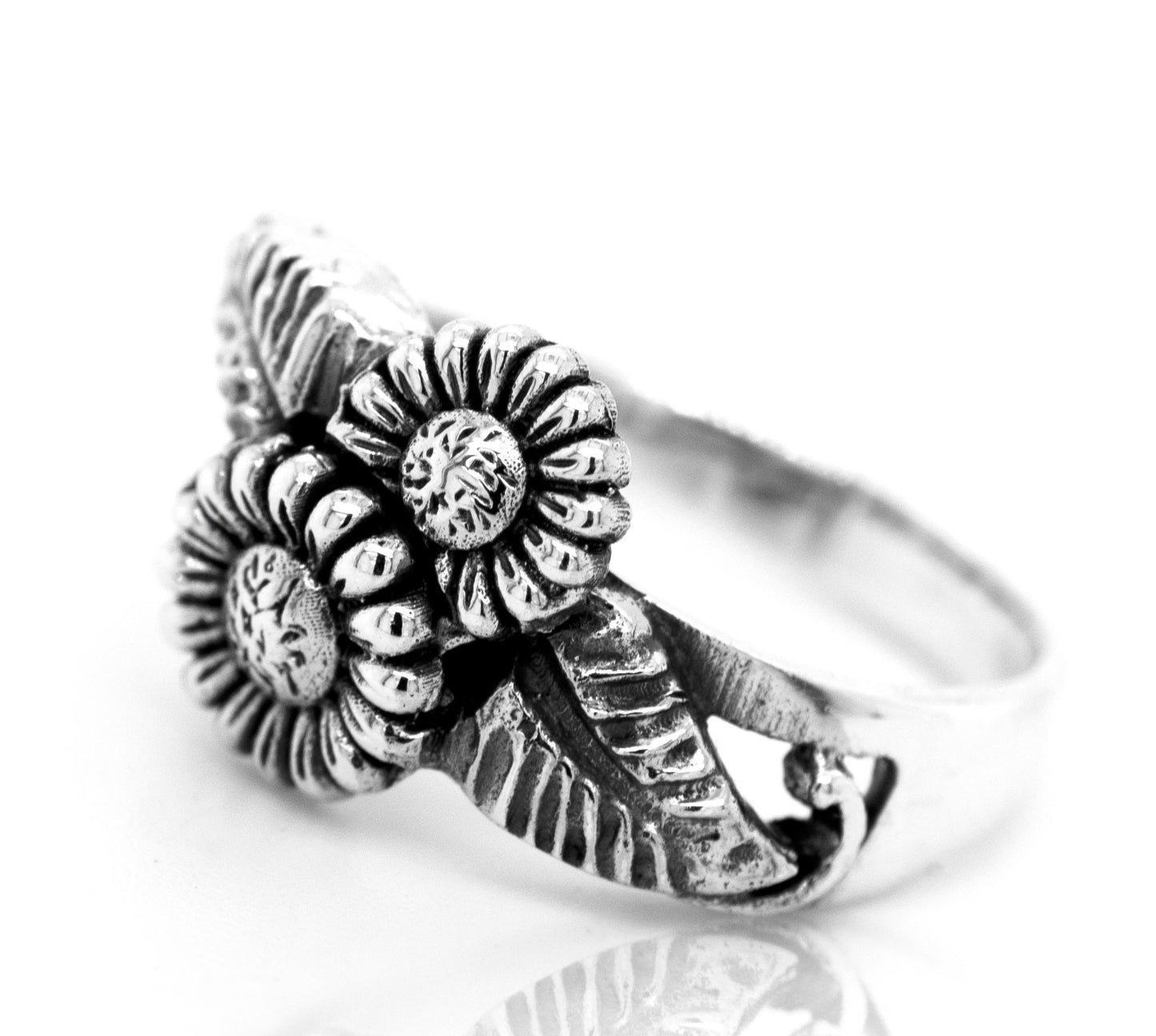 
                  
                    An Entwined Floral Ring, inspired by boho style and made of sterling silver, adorned with delicate floral designs.
                  
                