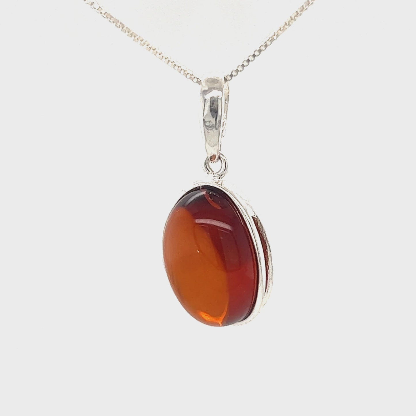 
                  
                    Load and play video in Gallery viewer, Timeless Oval Amber Pendant
                  
                