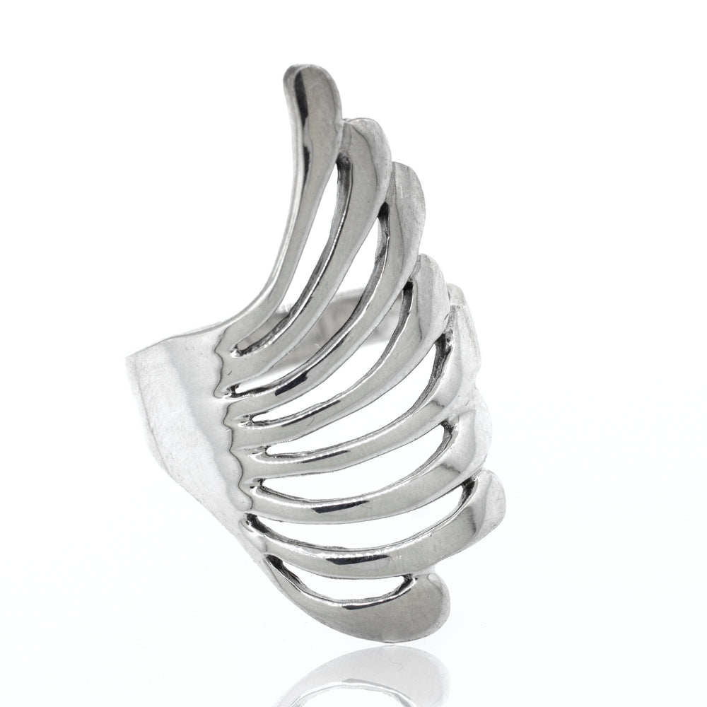 A high polish Super Silver wing ring with fan design on a white background.