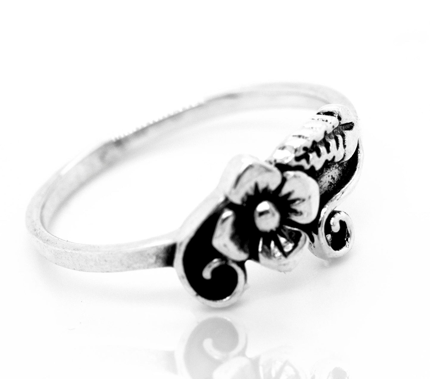 A Flower with Leaf and Swirl Design Ring that embodies the essence of nature.