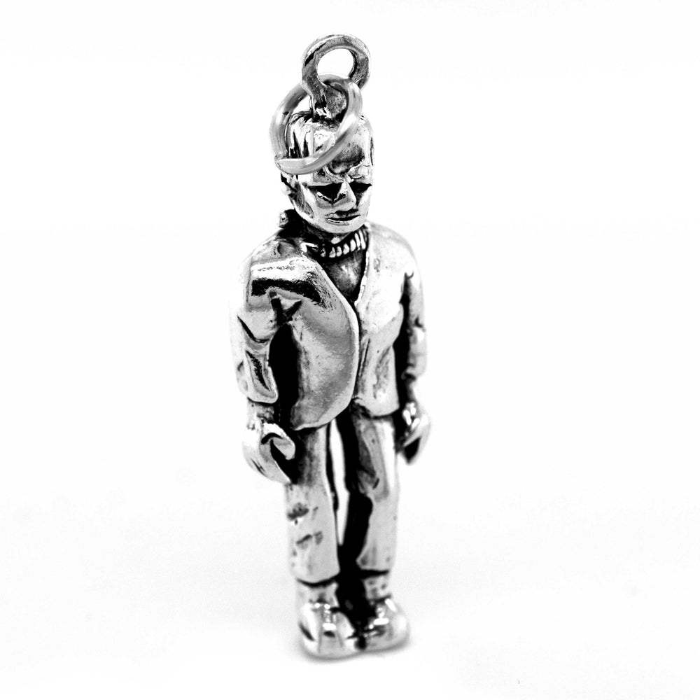 
                  
                    A Super Silver Frankenstein's Monster Pendant of a man in a suit.
                  
                