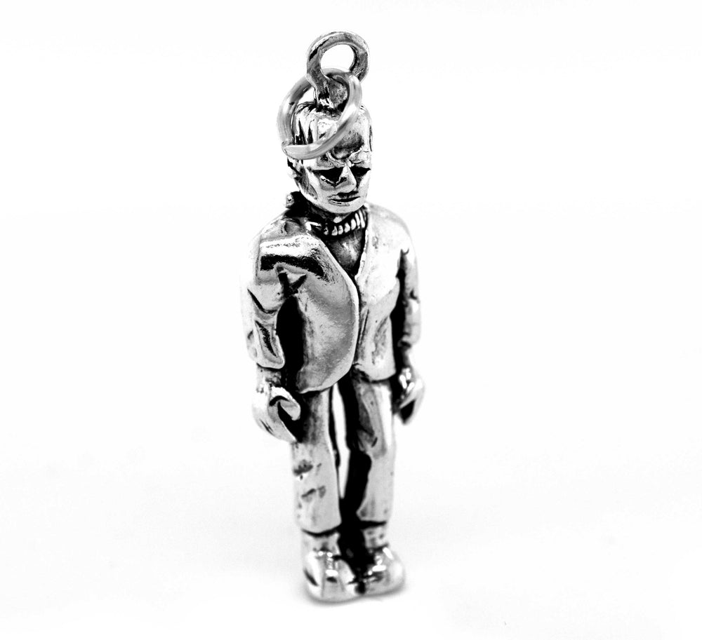 A Super Silver Frankenstein's Monster Pendant of a man in a suit.
