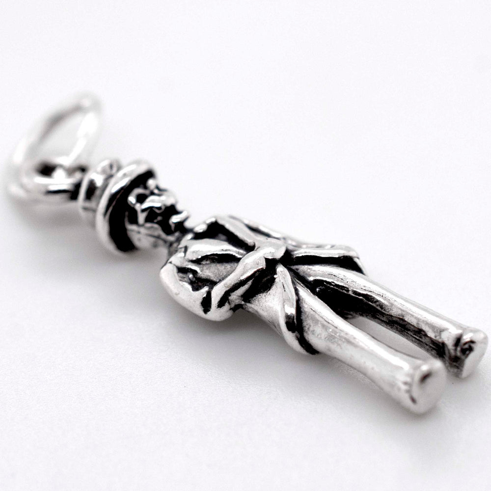 
                  
                    A Super Silver Skeleton Groom Charm displayed on a white surface, perfect for the Halloween season.
                  
                