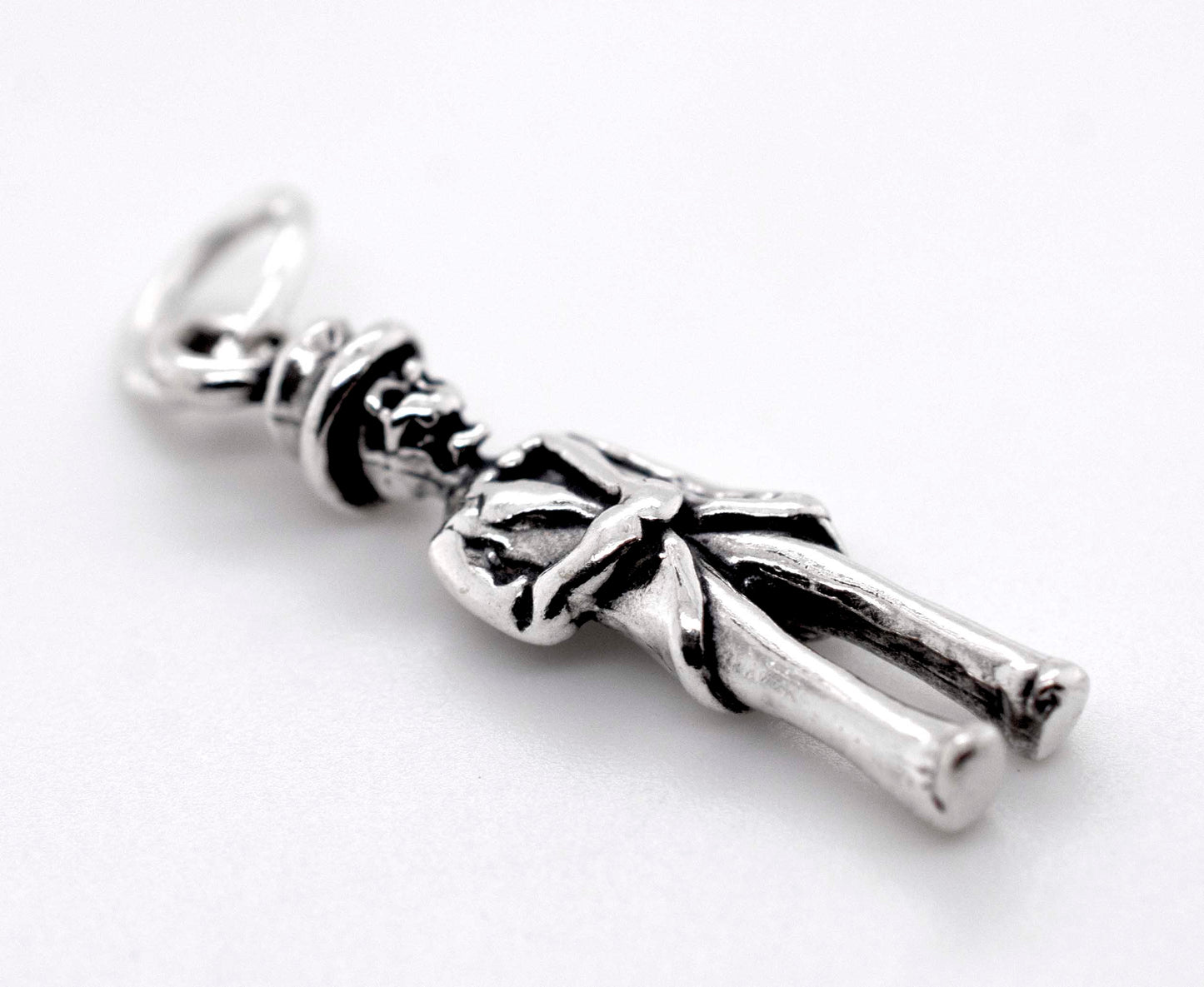 
                  
                    A Super Silver Skeleton Groom Charm displayed on a white surface, perfect for the Halloween season.
                  
                