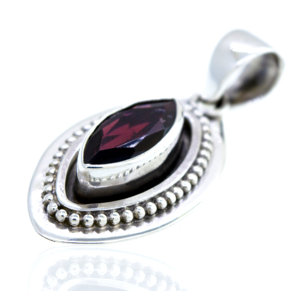 A Beautiful Marquise Shaped Garnet Pendant with Beads Design from Super Silver.