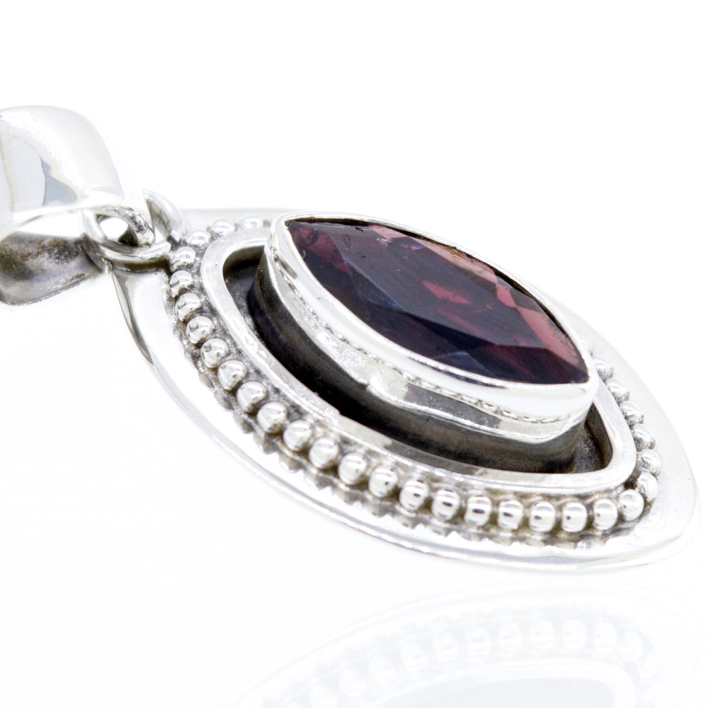 A Super Silver Beautiful Marquise Shaped Garnet Pendant With Beads Design.